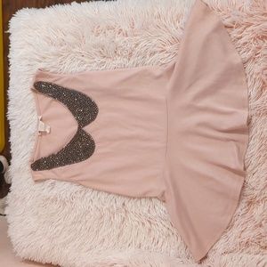 Light pink embellished peplum top